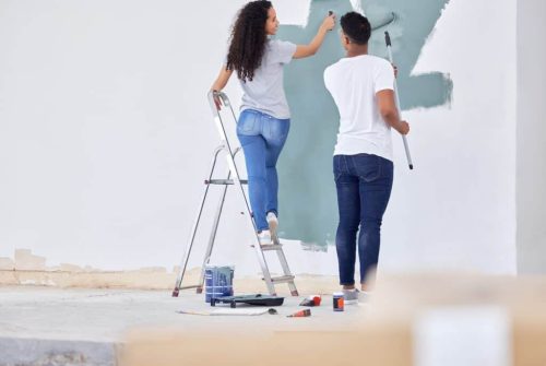 shot-of-a-young-couple-painting-a-wall-in-a-room-together-1024x702